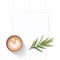 Flat lay top view elegant white composition paper coffee drink and tarragon leaf on wooden background