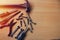 Flat lay, top view equipment tools screwdriver, screw, wrench, pliers, and hammers  on wooden background