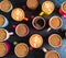 Flat lay top view the set of different types of coffee in mugs