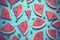 Flat lay top view watermelon slice, with mints on blue wooden table background