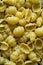 Flat lay of uncooked Gnocchetti pasta shells