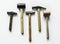 Flat lay of various hammers on white background