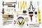 Flat lay of various technician tools on white background