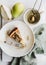 Flat-lay of vegan dairy-free sugar-free pear cheesecake piece