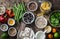 Flat lay vegetarian healthy food set - grains, vegetables, fruit, pasta, seeds on a brown wooden background, top view. Healthy foo