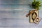 Flat lay view of vase, tasbih or rosary beads and Holy book of Al Quran