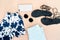 Flat lay of woman clothes and accessories set with shoes, watch.