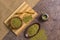 Flat lay yerba mate tea in calabash and in bowls with bamboo stand