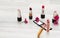 Flat lying, image of cosmetics. Top view of women`s makeup table including lipsticks, eye patches, foundation, brushes and others
