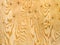 flat ornate yellow and brown structure of plywood natural texture and background