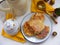 Flat rhoto of crepes pancakes with oak flakes on shabby wooden white background with rustic milk jug and russian nesting dolls