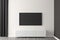 Flat smart tv panel on white wall with white sideboard and brown wooden floor - entertainment, media or home television set mock