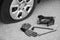 Flat tire of a car, wheel replacement tools, trouble on the road