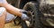 Flat tyre on road. Traveler Man changing tires on the car on the side of the road