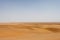 Flat up to horizon Dasht-e Kavir desert in Iran.