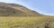 Flat upland and mild green slopes at Campo Imperatore upland, Abruzzo, Italy