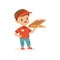 Flat vector illustration of cheerful delivery boy standing with pizza in hand. Worker suit for children role play