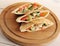 Flatbread pita filled with chicken breast, vegetables and sauce