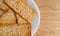 Flatbread salted multigrain crackers on a white plate