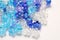 Flatlay blue Plastic flower on white background