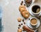 Flatlay business card or wallpaper, cup of coffee with cookies and cinnamon, soft and zen atmosphere