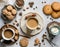 Flatlay business card or wallpaper, cup of coffee with cookies and cinnamon, soft and zen atmosphere