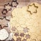 Flatlay, cookie dough with cookie cutters and flour, christmas b