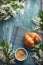 Flatlay food background - empty wooden board with croissants and honey, with copy space