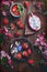 Flatlay food background - empty wooden board with strawberries and pink flowers, copy space