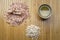 Flatlay photo of Himalayan sea salt, scoop, oats, and olive oil