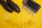 Flatlay Of Premium Dark Brown Grain Brogue Derby Boots Made of Calf Leather with Rubber Sole Placed With Yellow Maple Leaves And