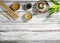 Flatlay or top view hot tea from a teapot in a cup, Japanese style and leaves on the old white wood table