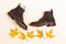 Flatlay of Upper View of Premium Dark Brown Grain Brogue Derby Boots Made of Calf Leather with Rubber Sole Placed With Yellow