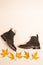 Flatlay of Upper View of Premium Dark Brown Grain Brogue Derby Boots Made of Calf Leather with Rubber Sole Placed With Yellow