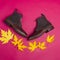 Flatlay View of Premium Dark Brown Grain Brogue Derby Boots Made of Calf Leather with Rubber Sole Placed With Yellow Maple Leaves
