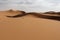 Flats of Sahara desert in Morocco on sunset