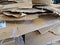 Flattened cardboard boxes stacked randomly