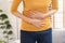 Flatulence asian young woman, girl hand in stomach ache, suffer from food poisoning, abdominal pain and colon problem, gastritis