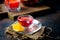 flavored Fruit red Tea in glass cup and kettle, tea ceremony