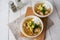 Flavorful White Chicken Chili made with hearty beans, tender chicken, and a rich and creamy broth in slow cooker