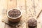 Flax seeds in a bowl on wooder background, Healthy eating concept