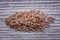 Flax seeds, Linseed placed on a wooden table Linum usitatissimu