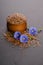 Flax seeds in the wooden bowl, beauty flower