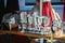 Flea market: Dishes and dinnerware in the foreground, people in the blurry background