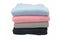 Fleece bedspreads. Four colors. Stack of covers.