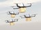 Fleet of autonomous unmanned drones delivering cardboard box in the sky