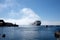 Fleet of cruise ships sailing through a dense fog in the harbor of Qaqortoq, Greenland