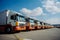 Fleet of parked trucks at a logistics companys yard for commercial freight transport