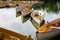 A fleet of rental rowboats bound to one another on a lake