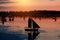 Fleet of Toy Sailboats at Sunset.